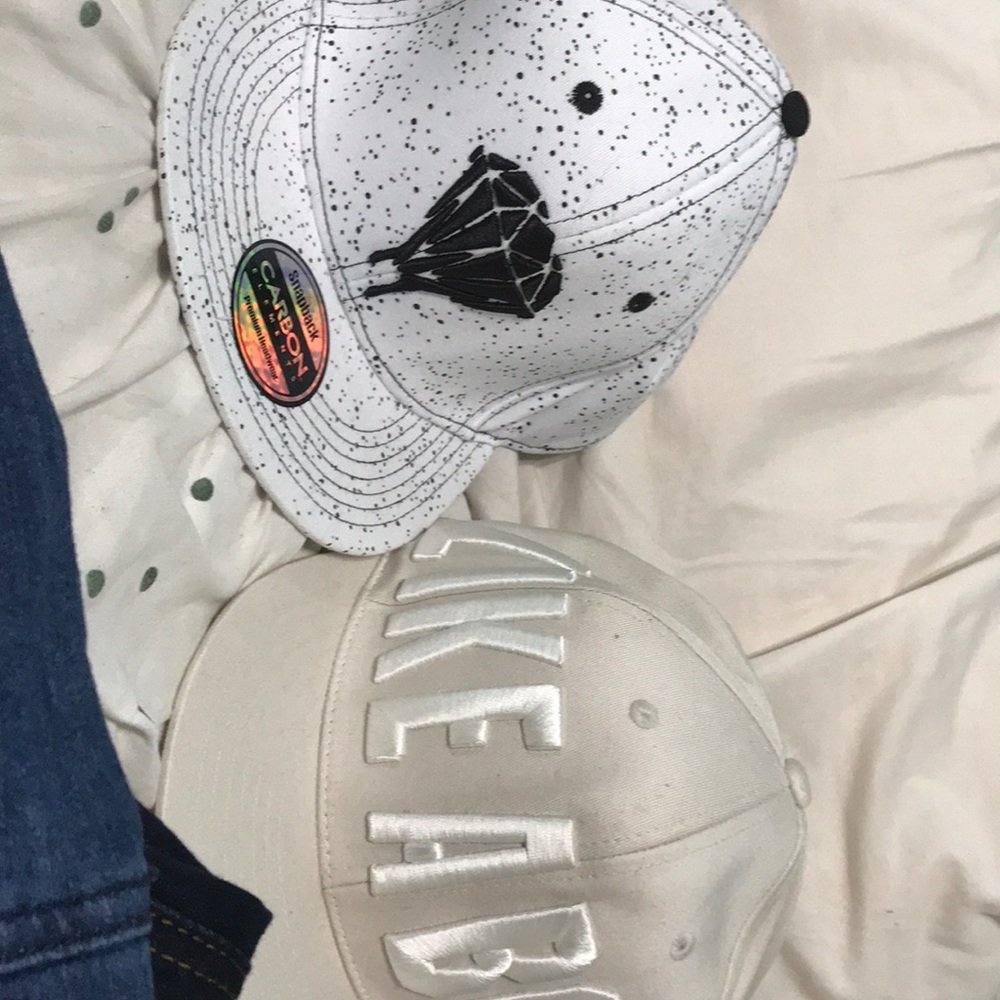 Two Carbon Elements hats.